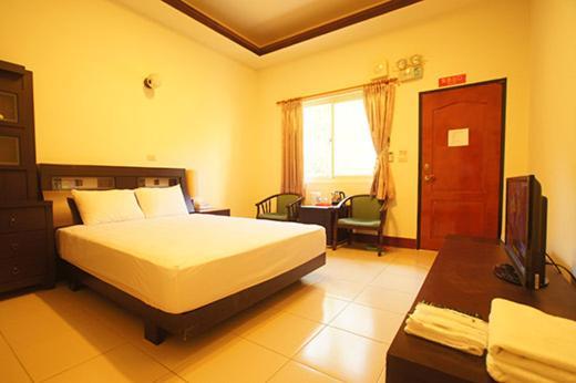 Yi Jia Yuan Homestay Наньчжуан Номер фото
